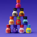 SIP Elixir bottles stacked in a pyramid including Sunset Punch, Xpresso, Citrus Spark, Tropical Crush, Watermelon, Blue Razz, Hurricane, Dreamberry, Wild Berry and Electric Lemon