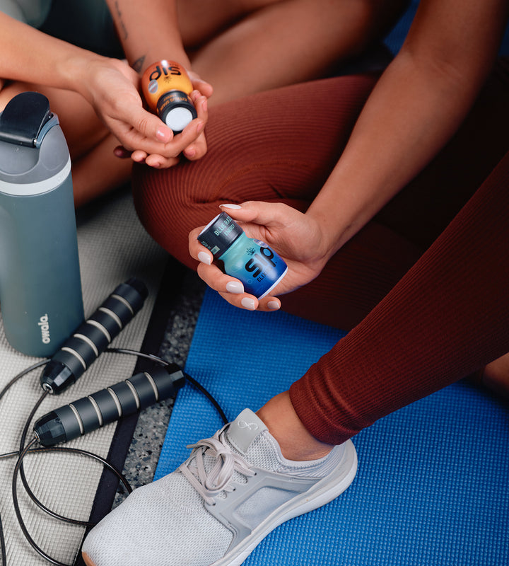 SIP Elixirs - Two girls working out at the gym with Sip bottles